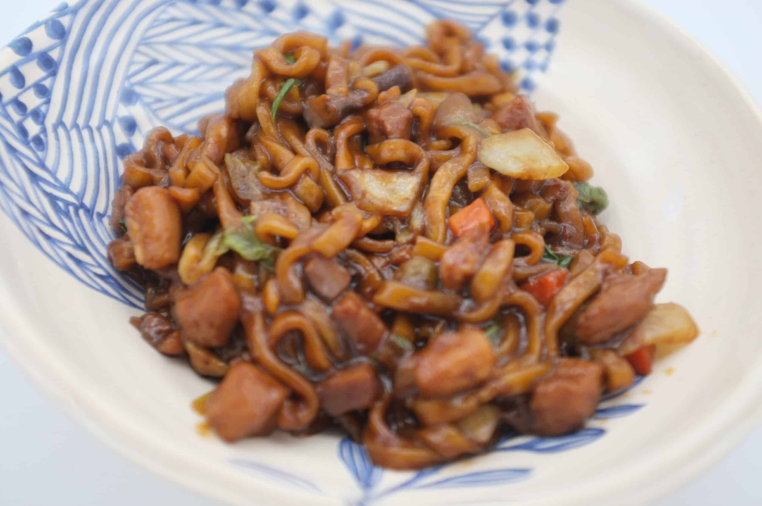 Korean Black bean noodle or jajangmyeon - noodle with black sauce.