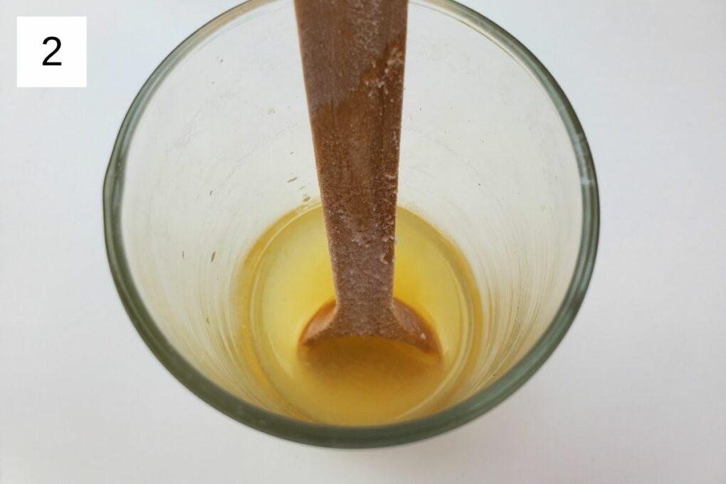 a mixture of yuzu juice in a glass