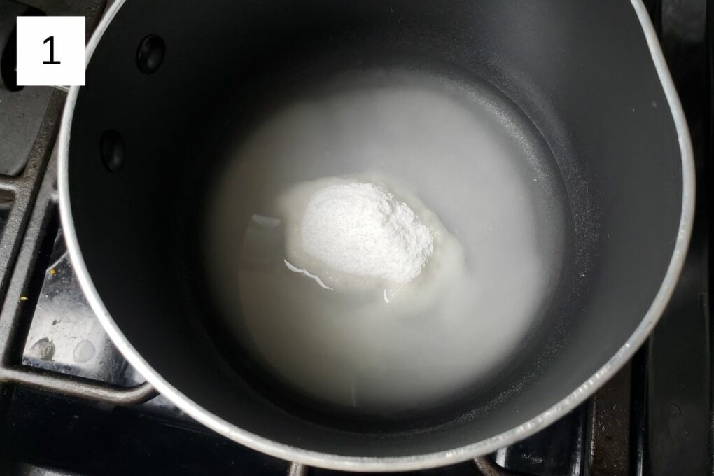 a mixture of water and sugar in a pot
