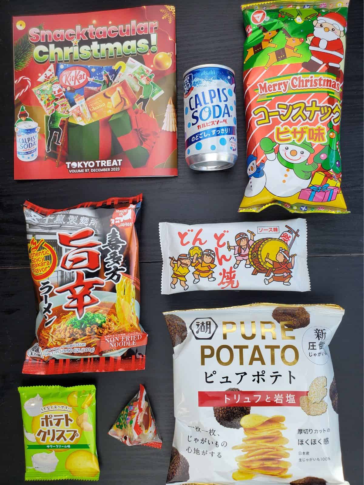 all of the savory tokyo treats snacks laid out on the table.