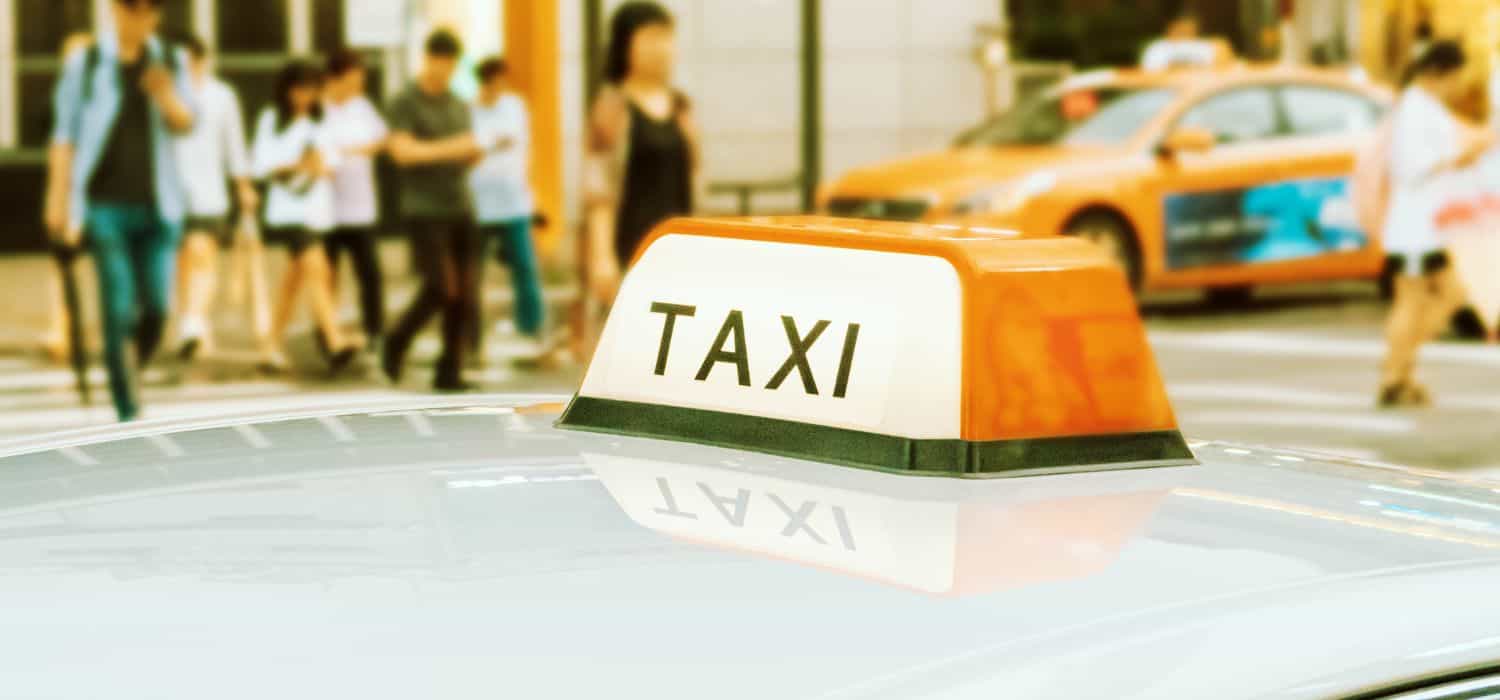 closeup of a taxi in front of a taxi stand in Seoul, South Korea.