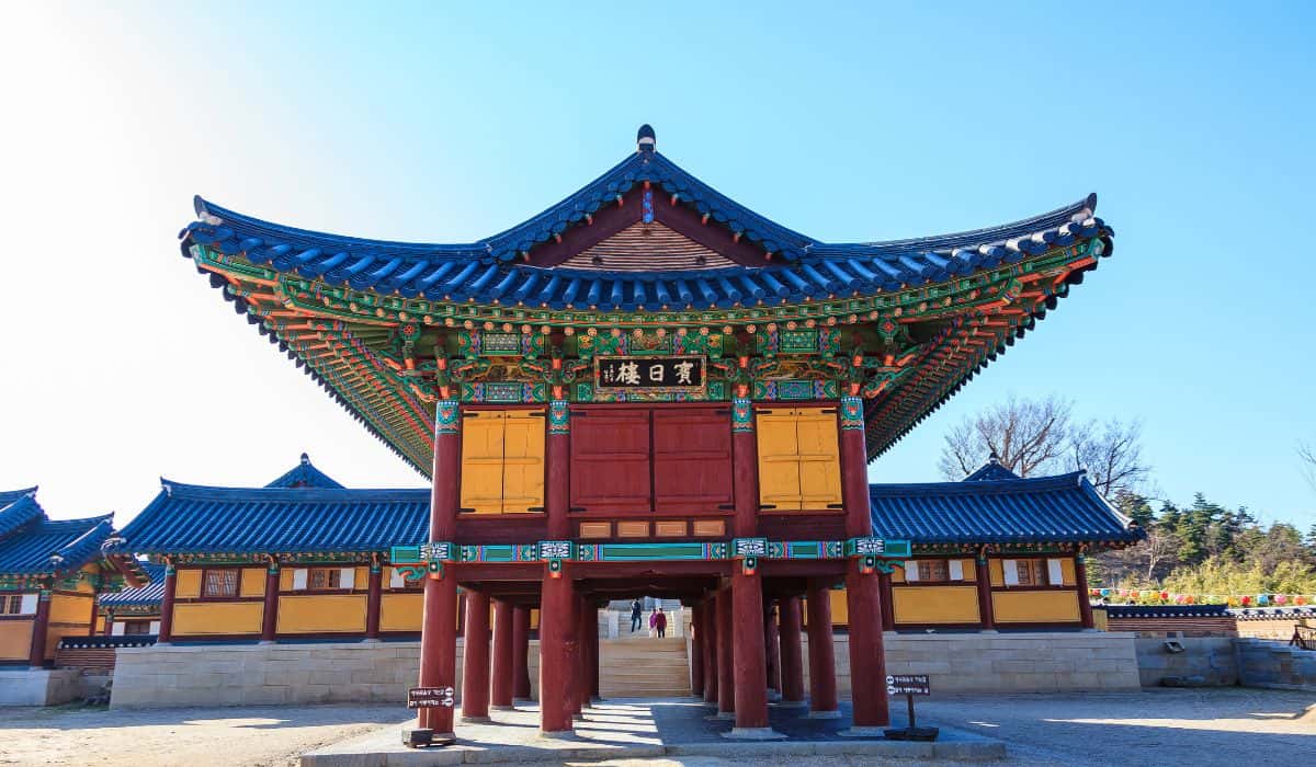 A colorful Korean Buddhist Temple during the day.