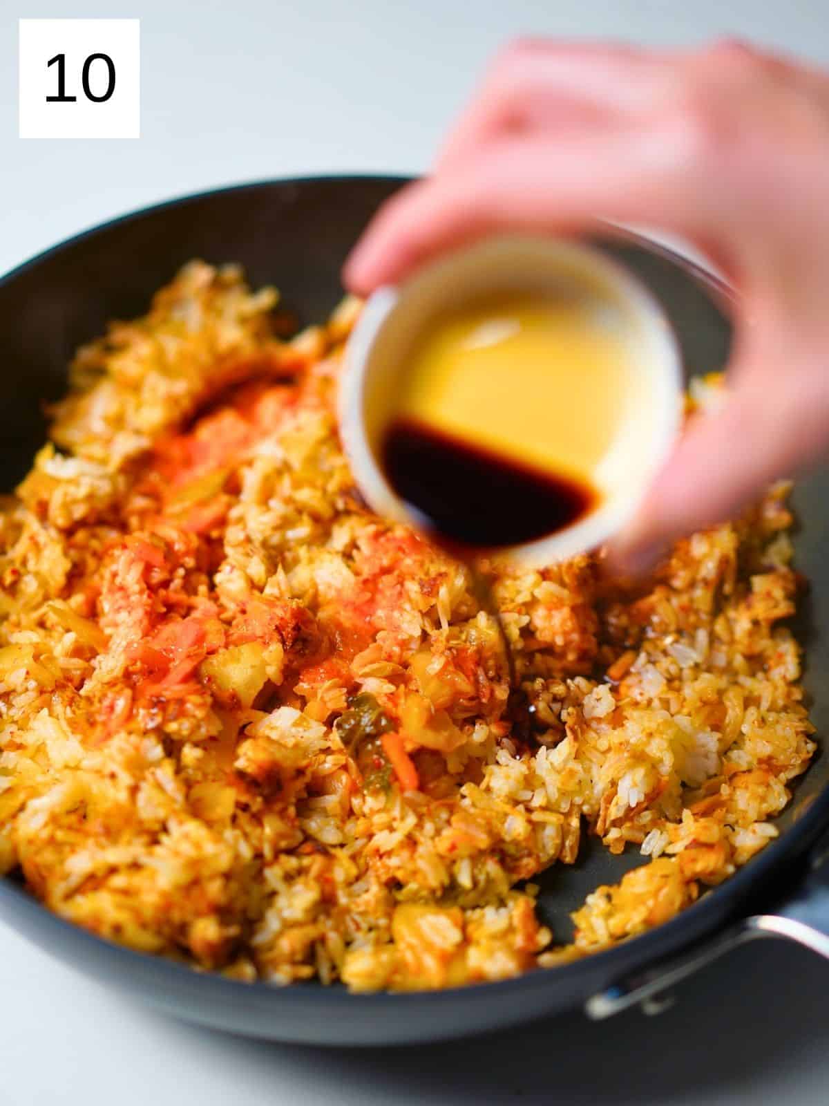 Cooking kimchi fried rice.