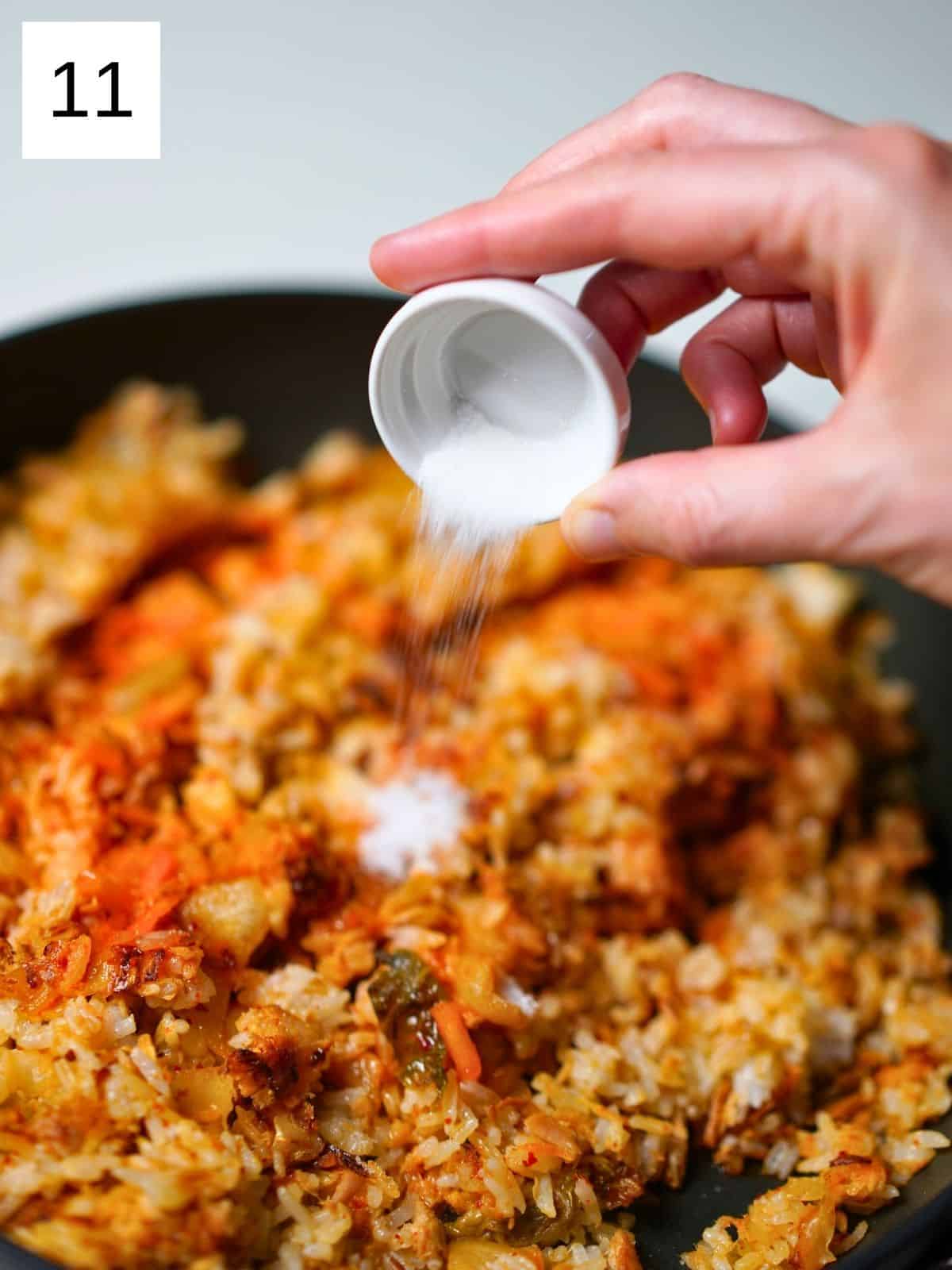 Cooking kimchi fried rice.