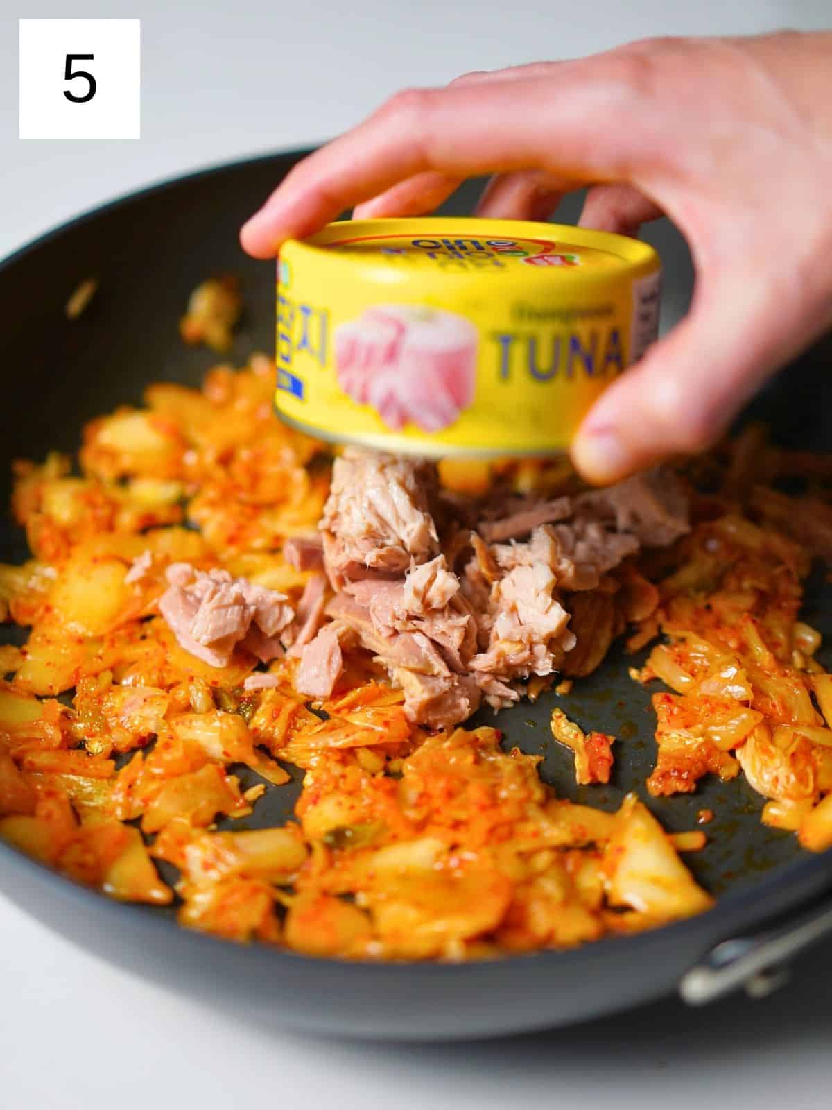 Kimchi and tuna in a pan.