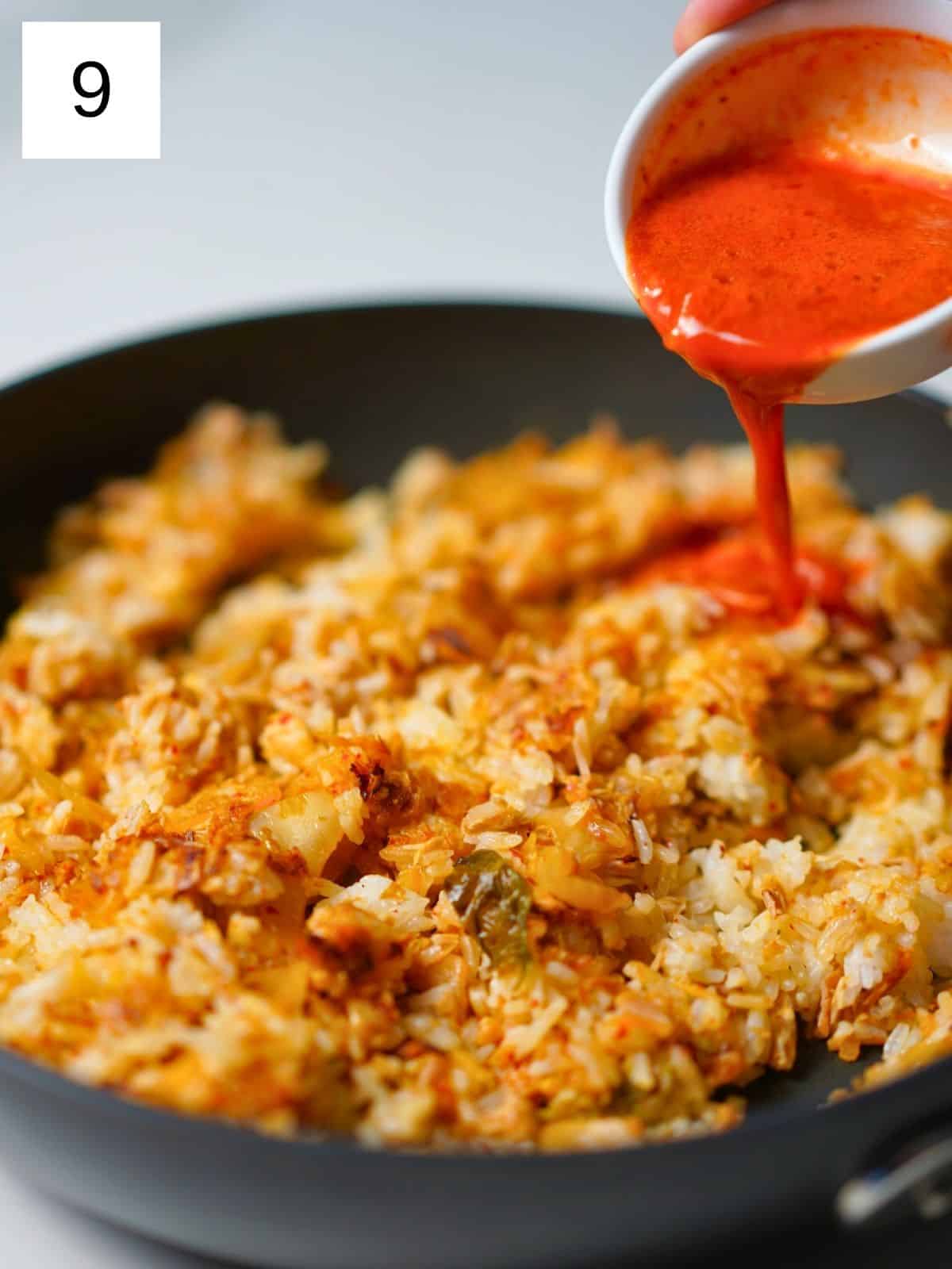 Cooking kimchi fried rice.