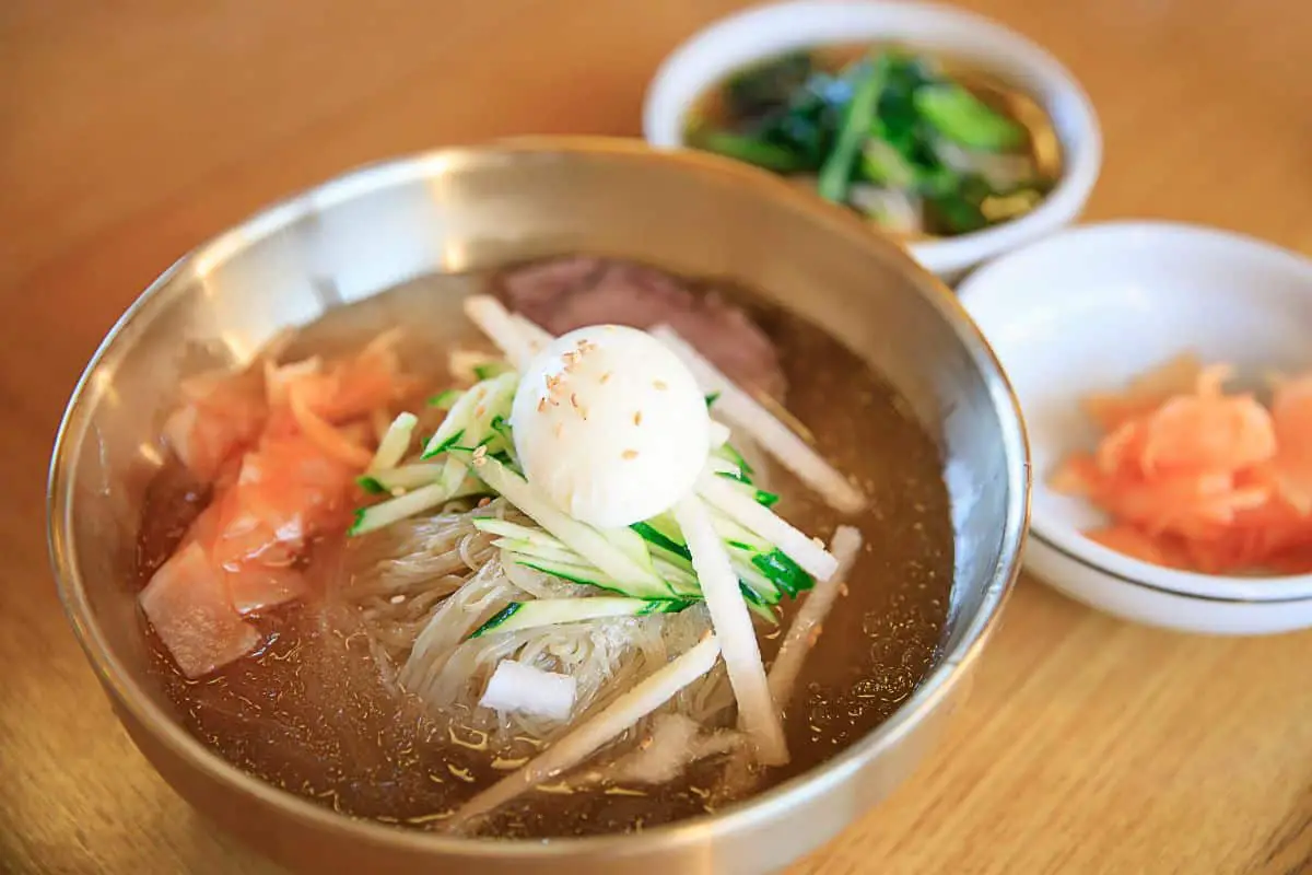 korean noodle naengmyeon in a bowl.