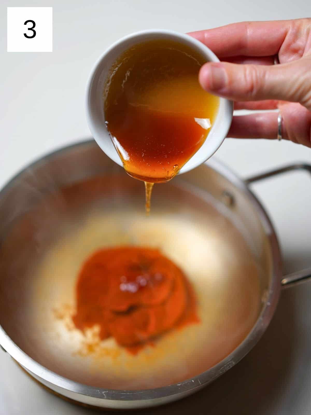 Mixing sauces and oil for rabokki.