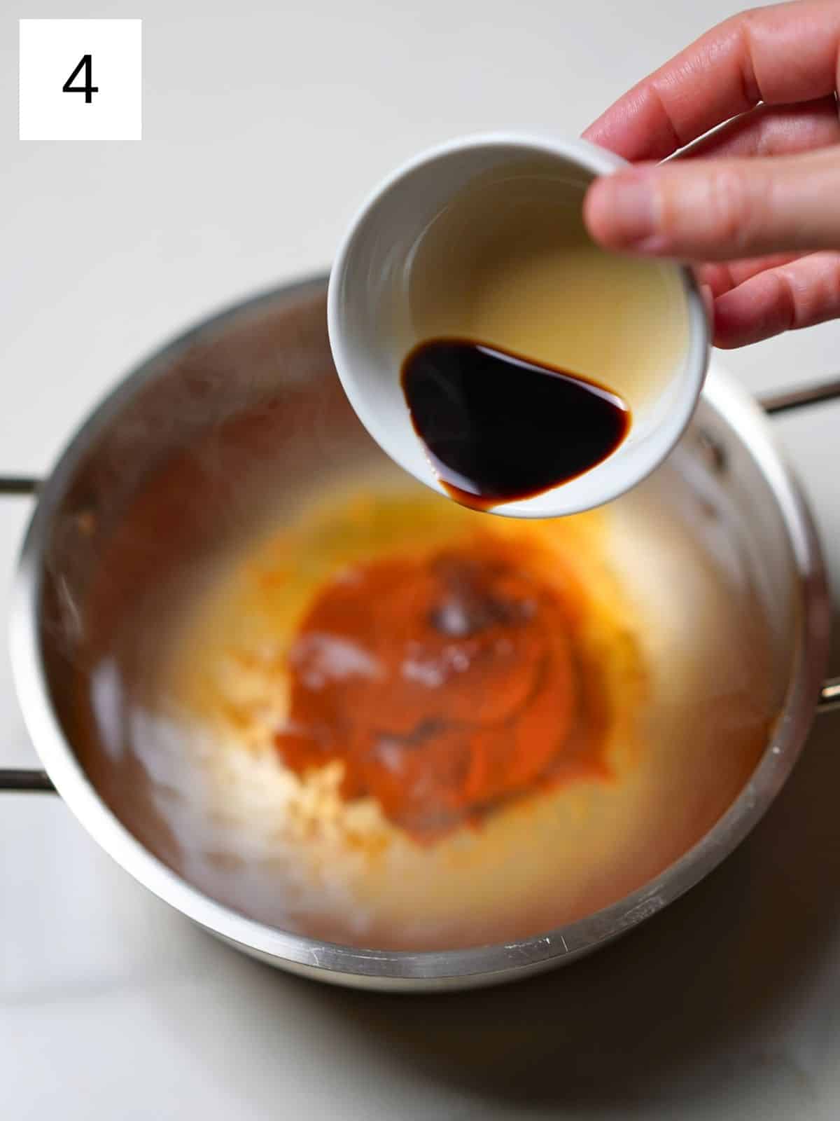 Mixing sauces and oil for rabokki.