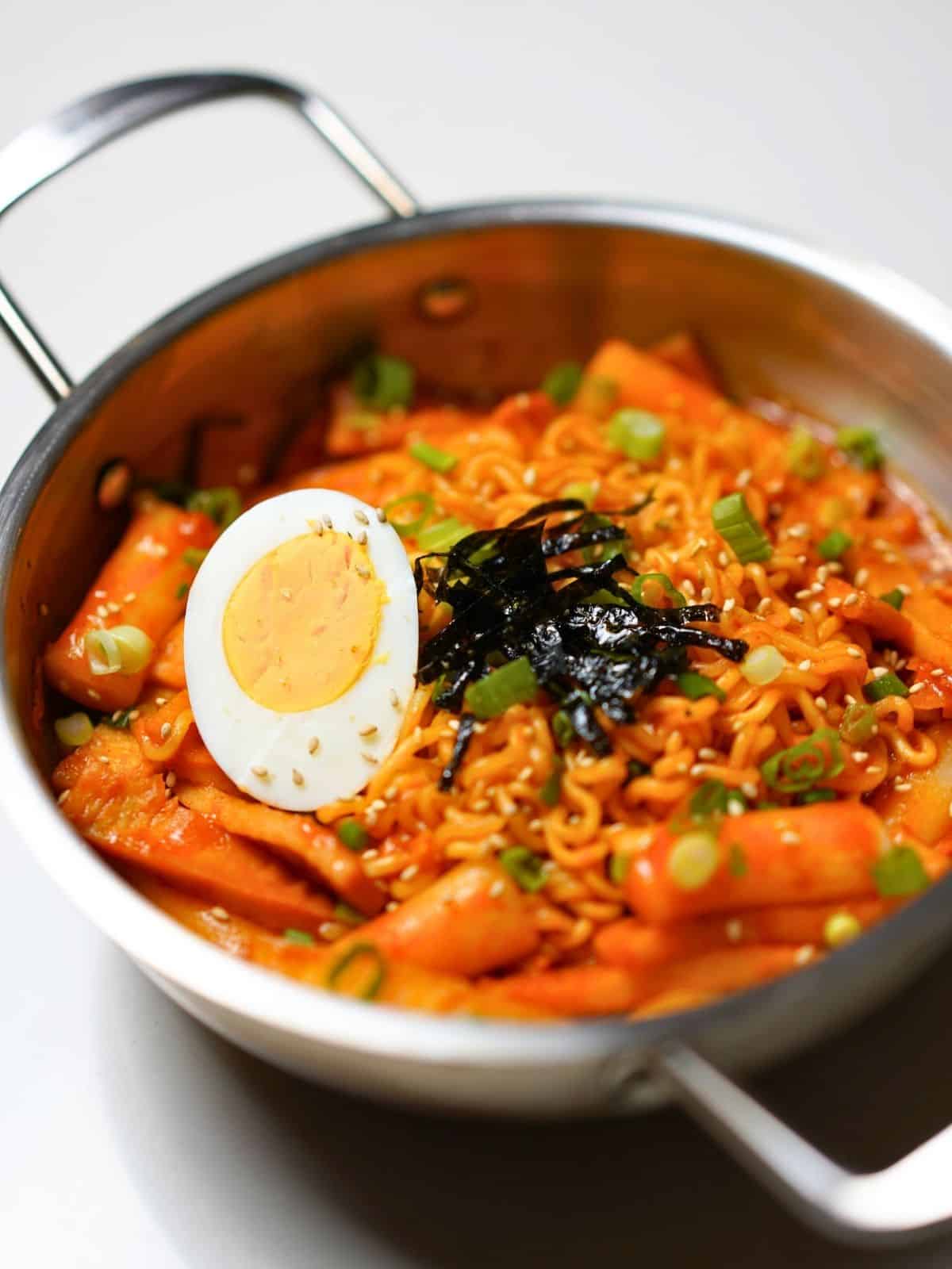 Rabokki with boiled egg in a bowl.