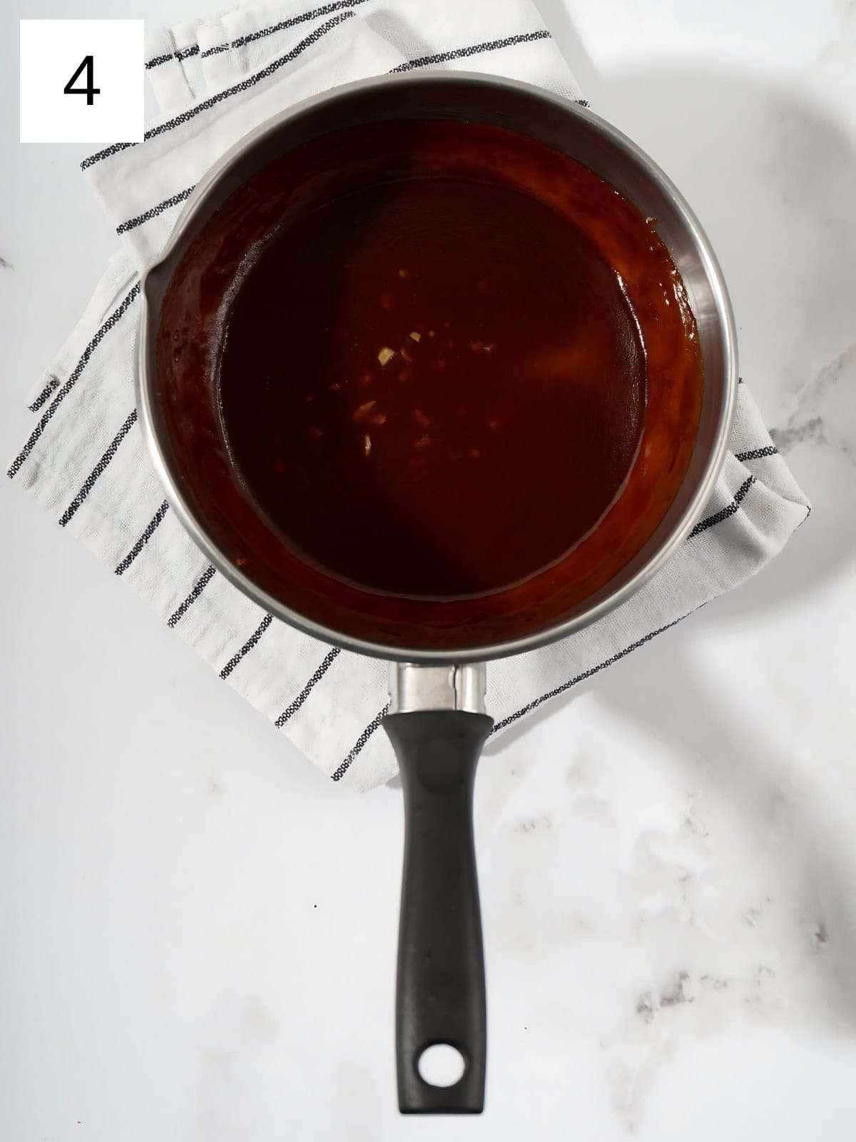 Gochujang mixture in a heated pan.