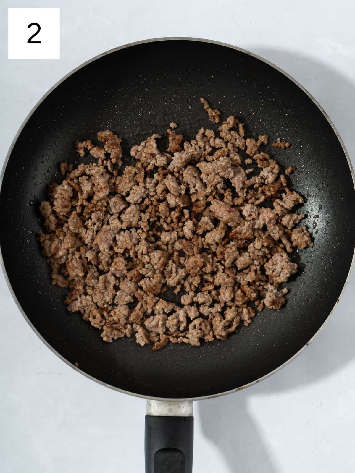 Cooked ground meet in a pan.