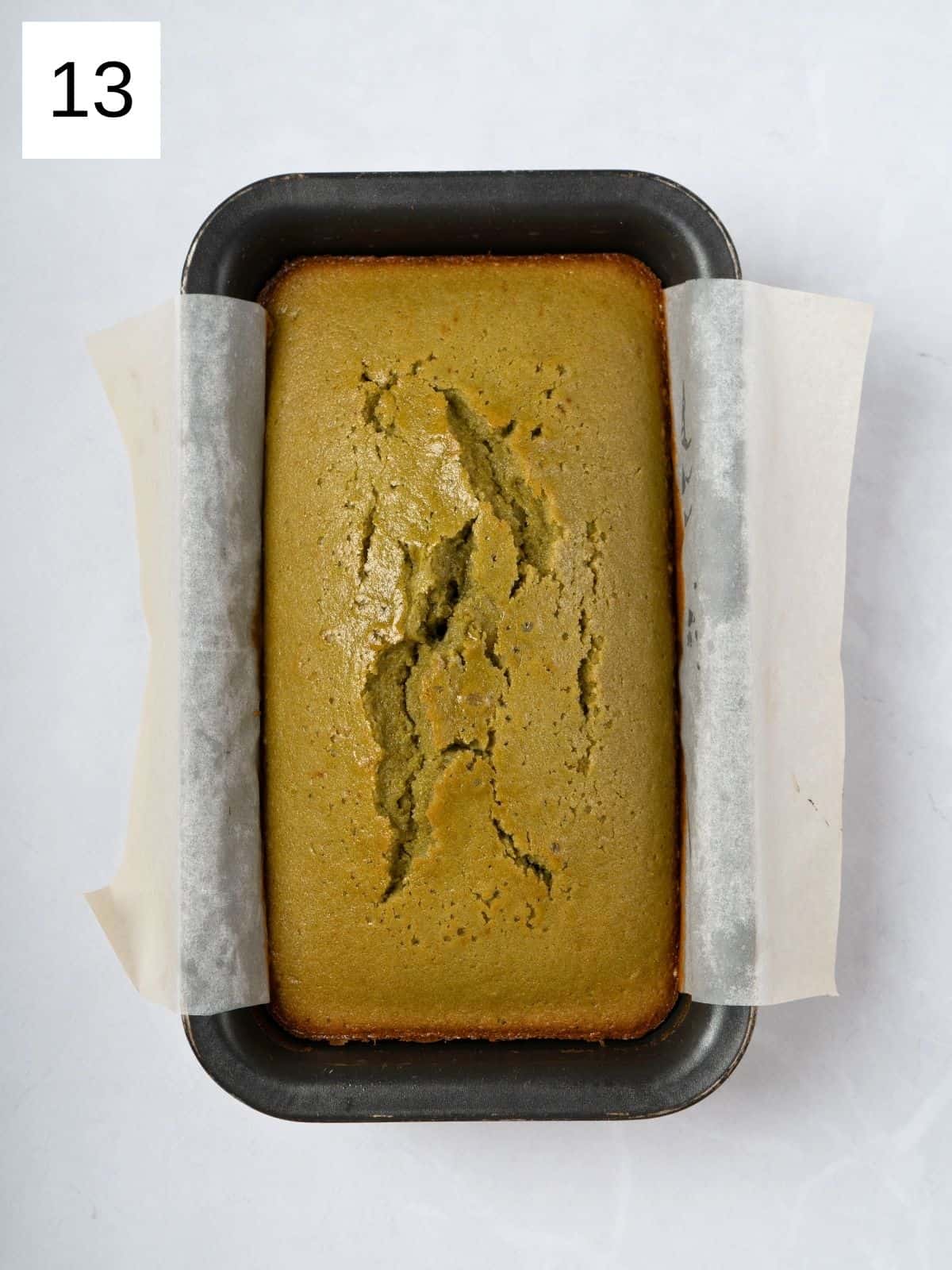 Fresh baked matcha cake in a tray.