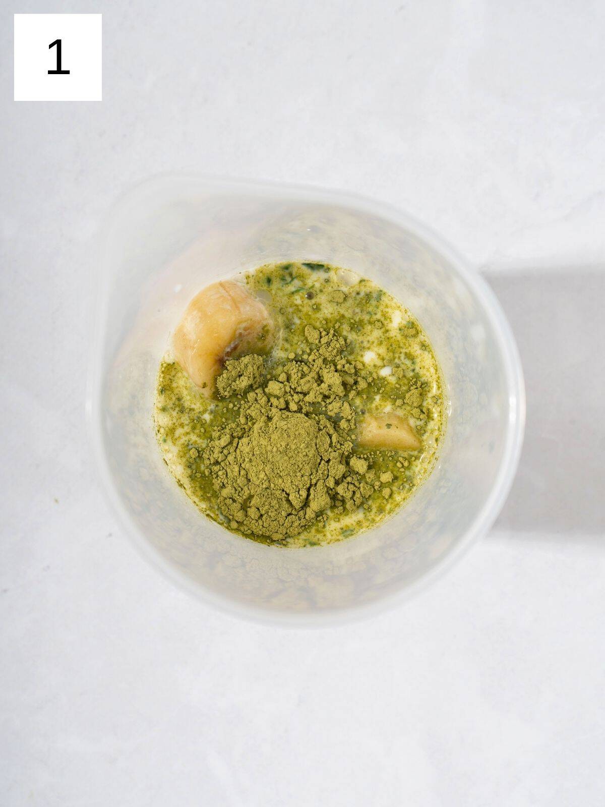 A mixture of matcha powder, milk, and fruit.