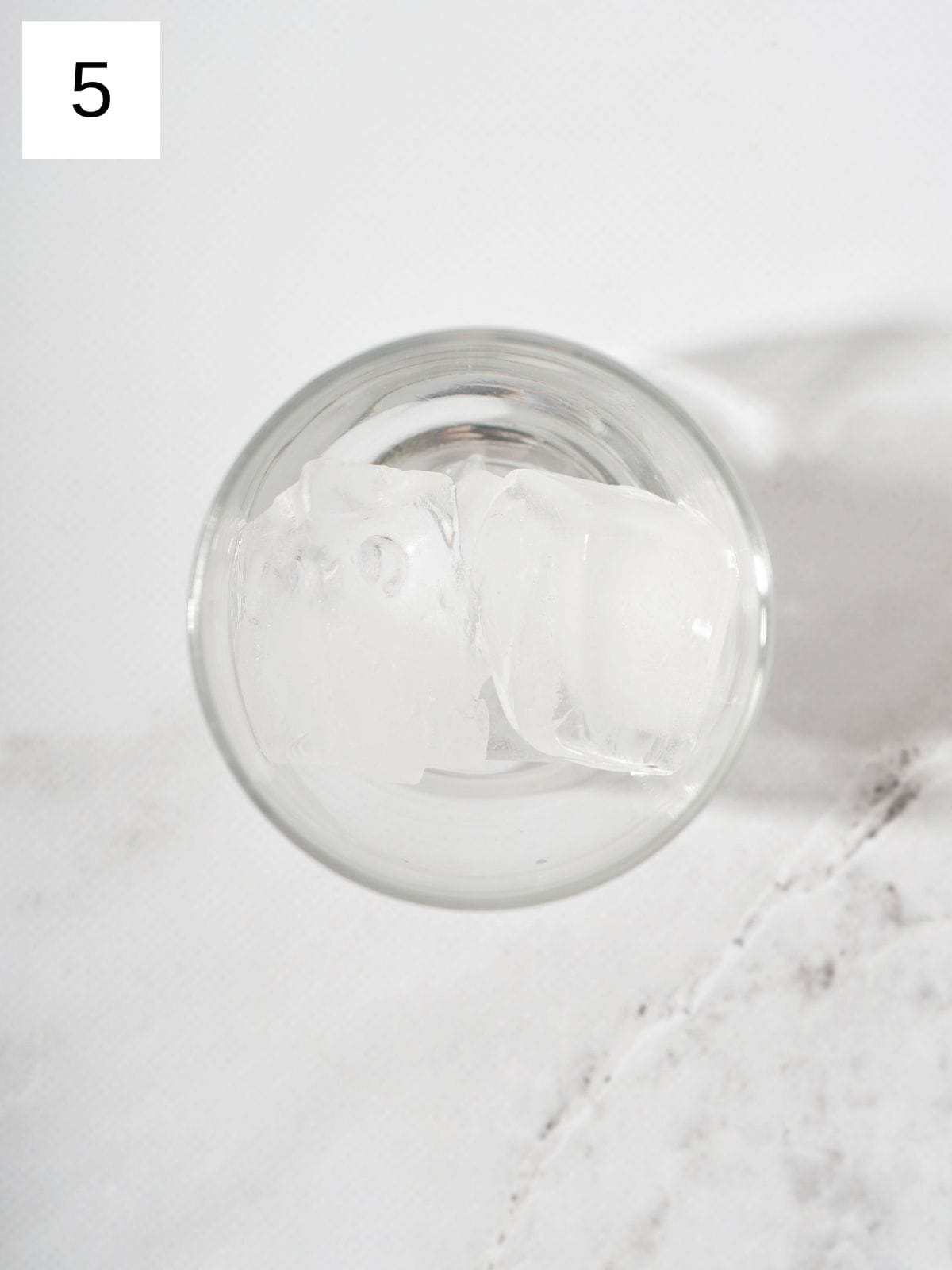 A glass with ice.