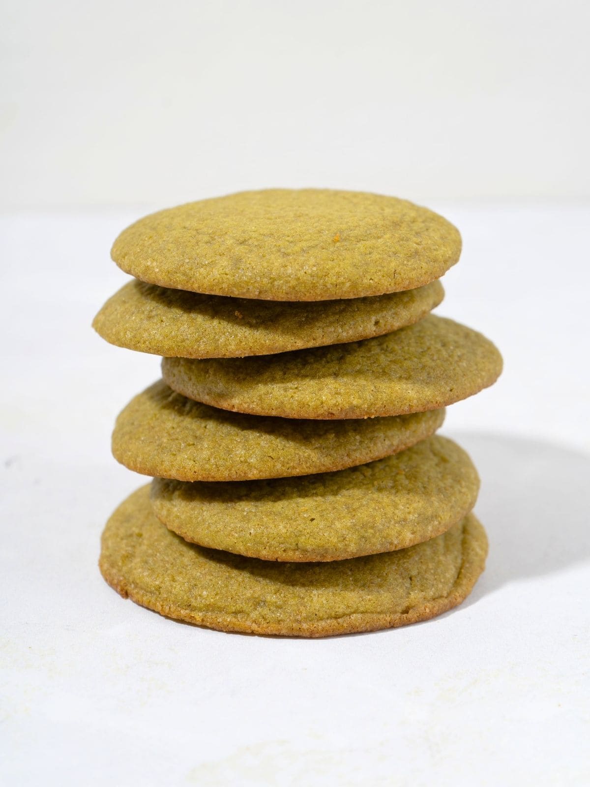 Stacked matcha cookies.