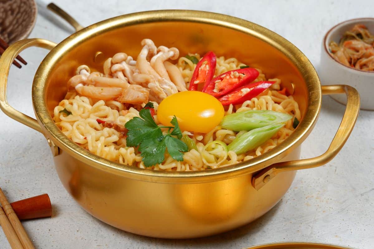 A pot of ramyeon served in Korean style.