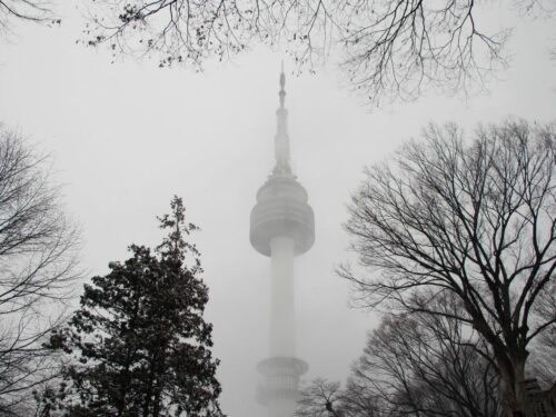 Seoul Tower during winter snowstorm, South Korea.