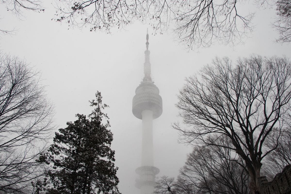 Seoul Tower during winter snowstorm, South Korea.