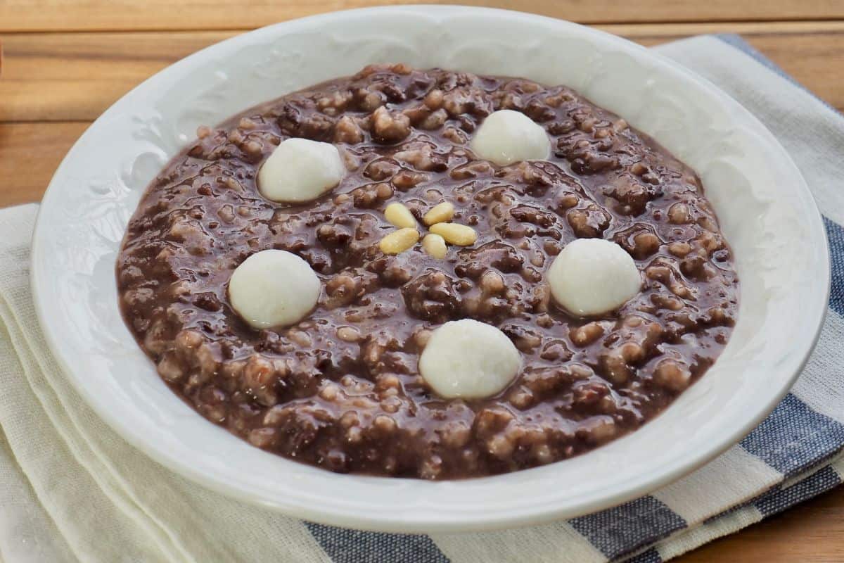 A plain bowl of Korean red bean porridge.