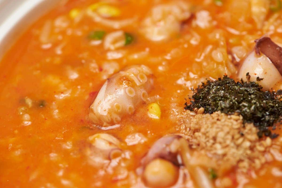 A close up photo of Korean spicy seafood porridge.