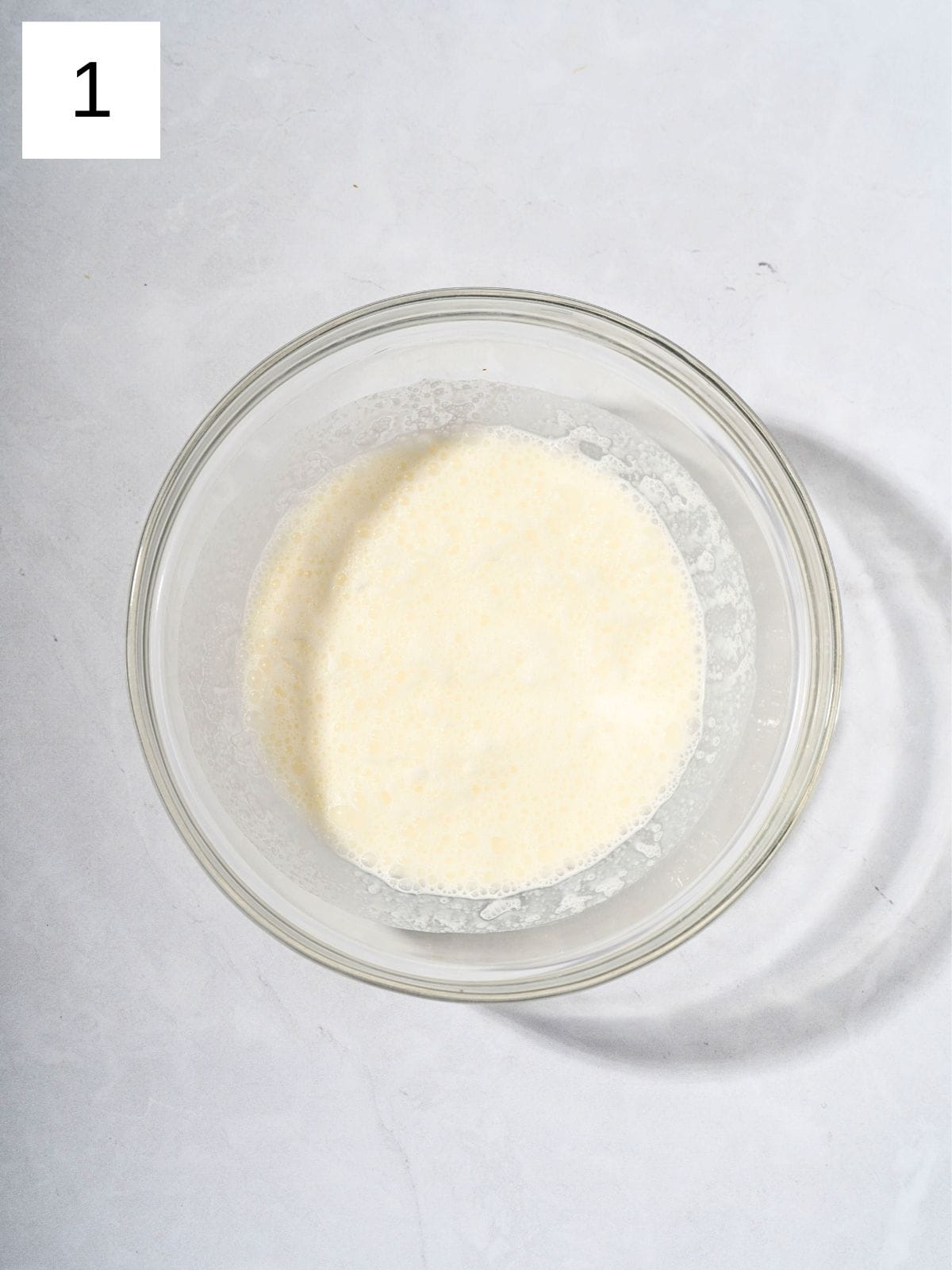 A bowl filled with whipped heavy cream.