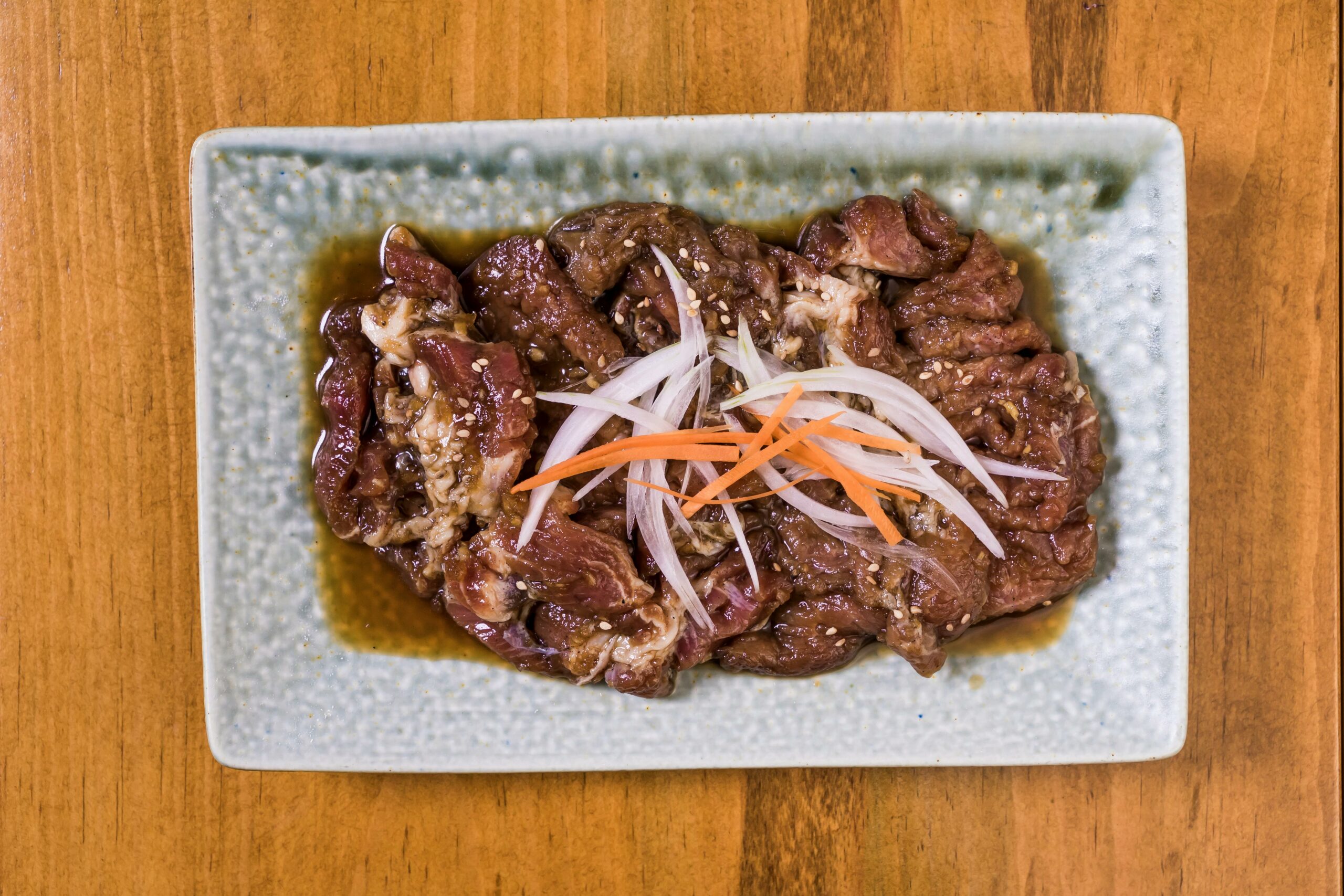 Marinated beef on a plate.