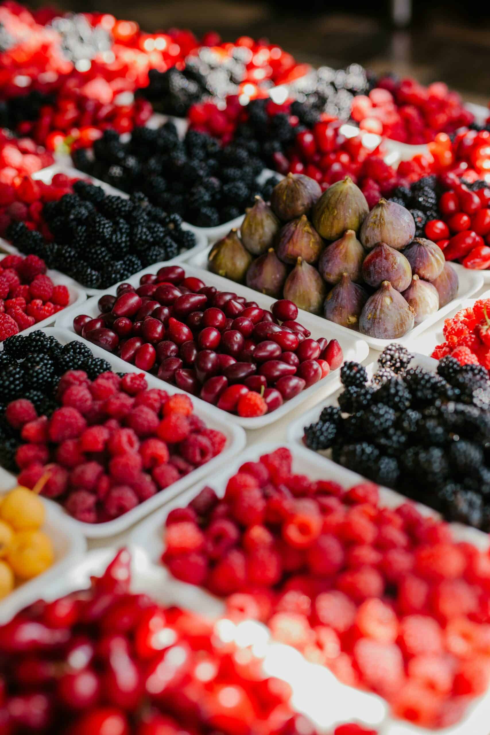 Fruit stand with bokbunja and other fruits.