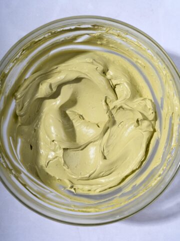 A bowl filled with whipped matcha butter.