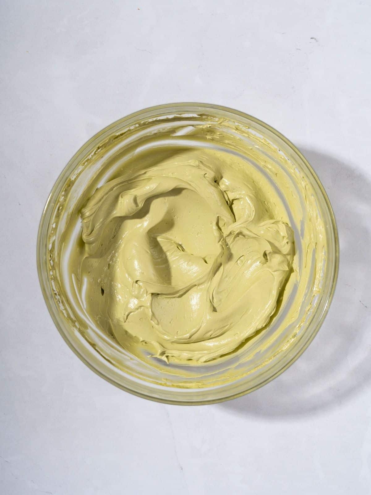 A bowl filled with whipped matcha butter.