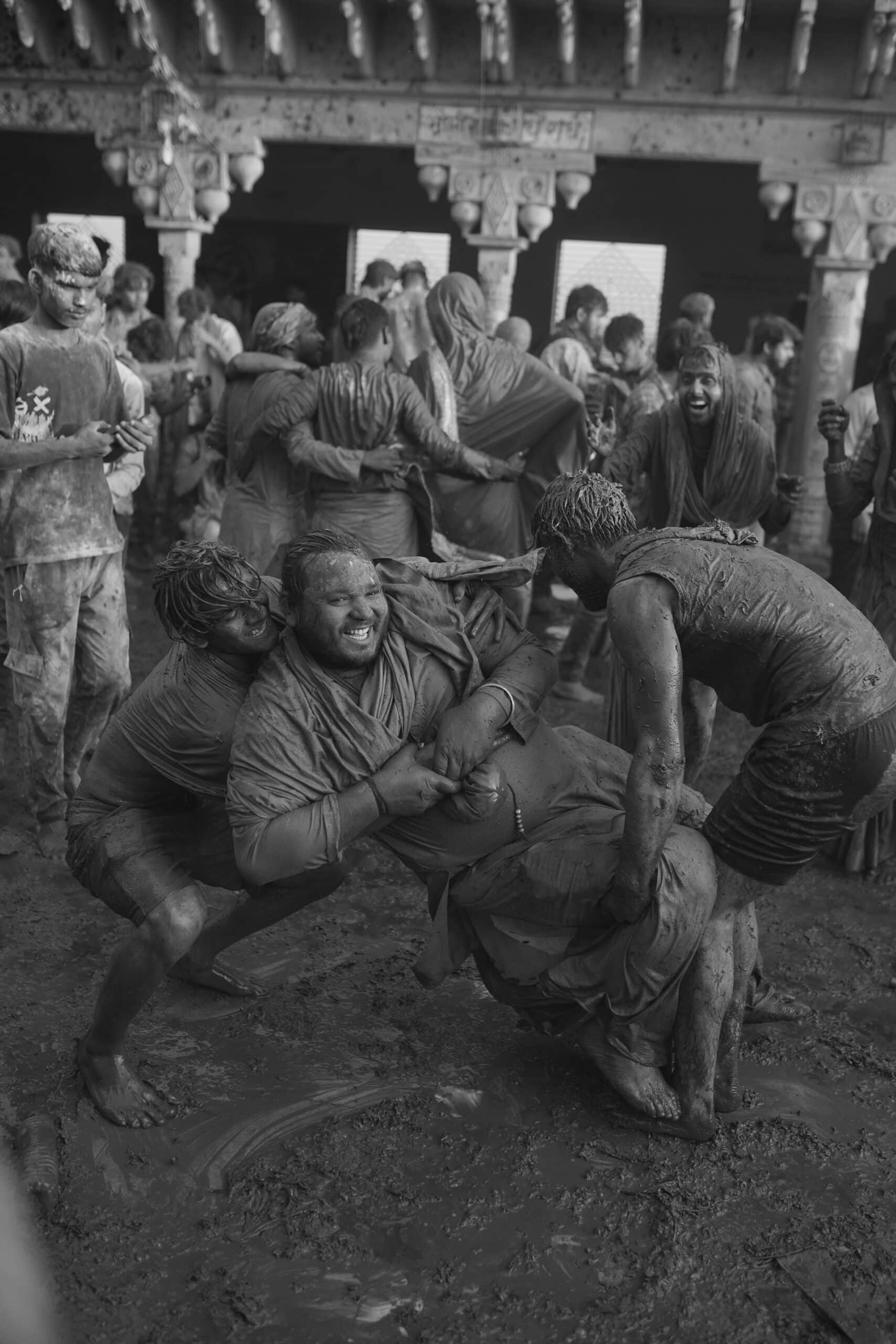 People having fun during the mud festival.