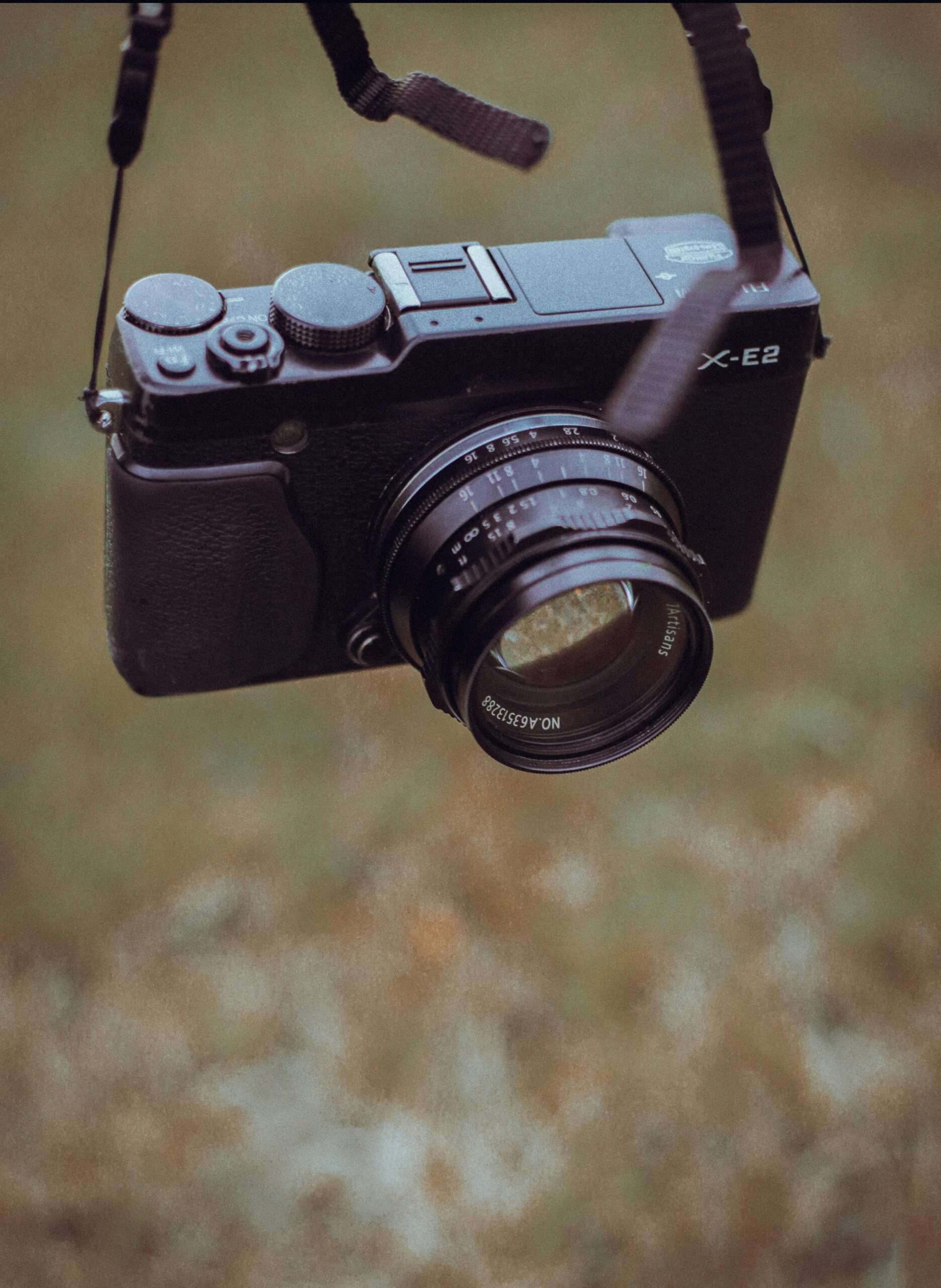 Camera with strap on.