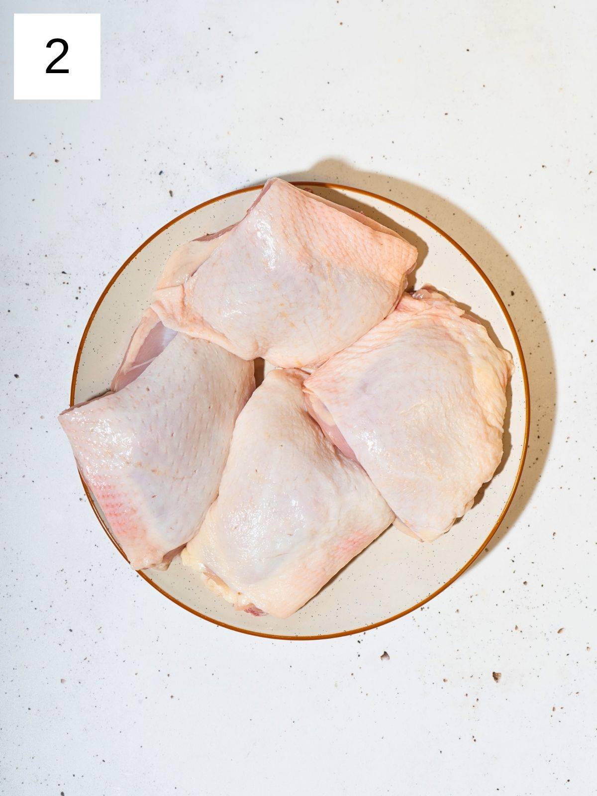 Patted dry chicken thighs.
