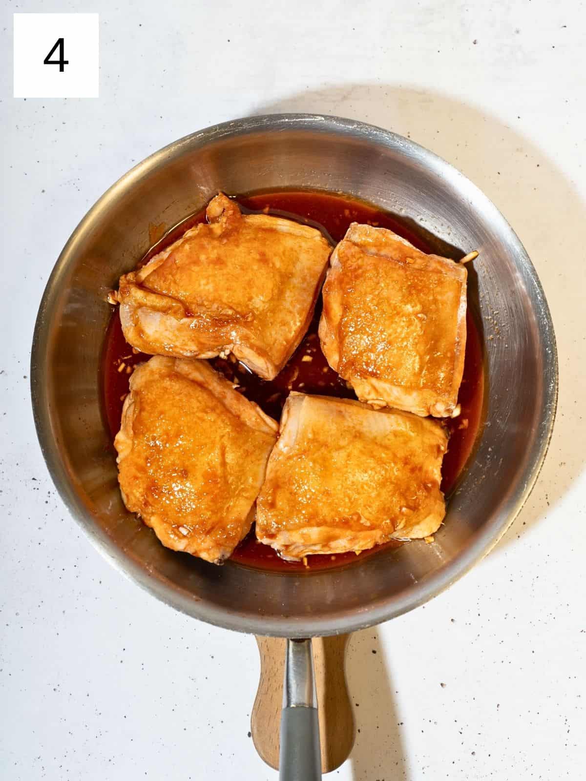 Flipped the chicken thighs with honey gochujang sauce.