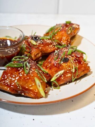 A serving of gochujang chicken thighs.