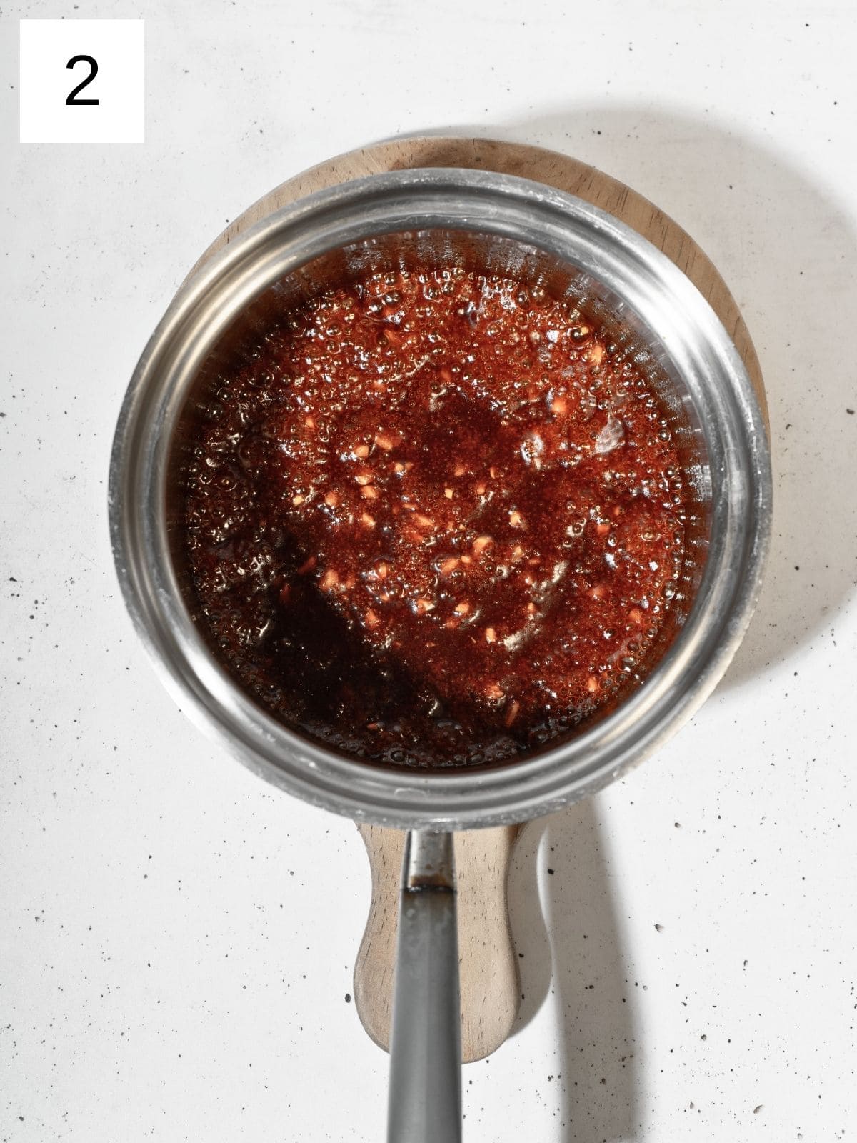 Cooking sauce over medium heat.