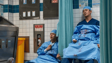 Two surgeons from an operation.