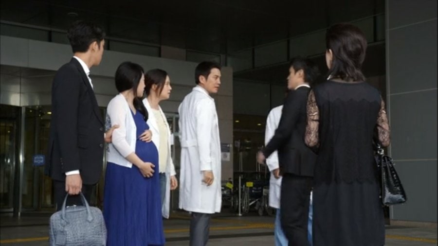 A group of doctors having a conversation.