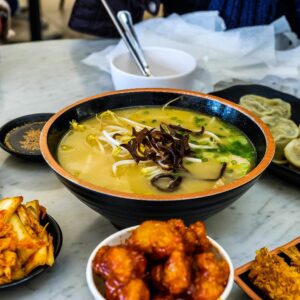 Korean foods served on a table.