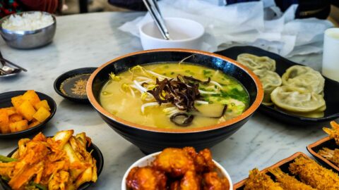 Korean foods served on a table.