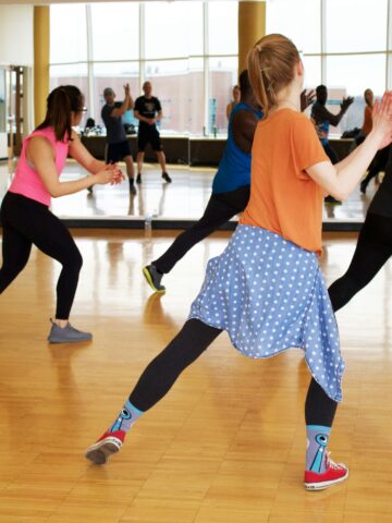Energetic dance class in Seoul Korea Asia fitness studio with diverse participants.