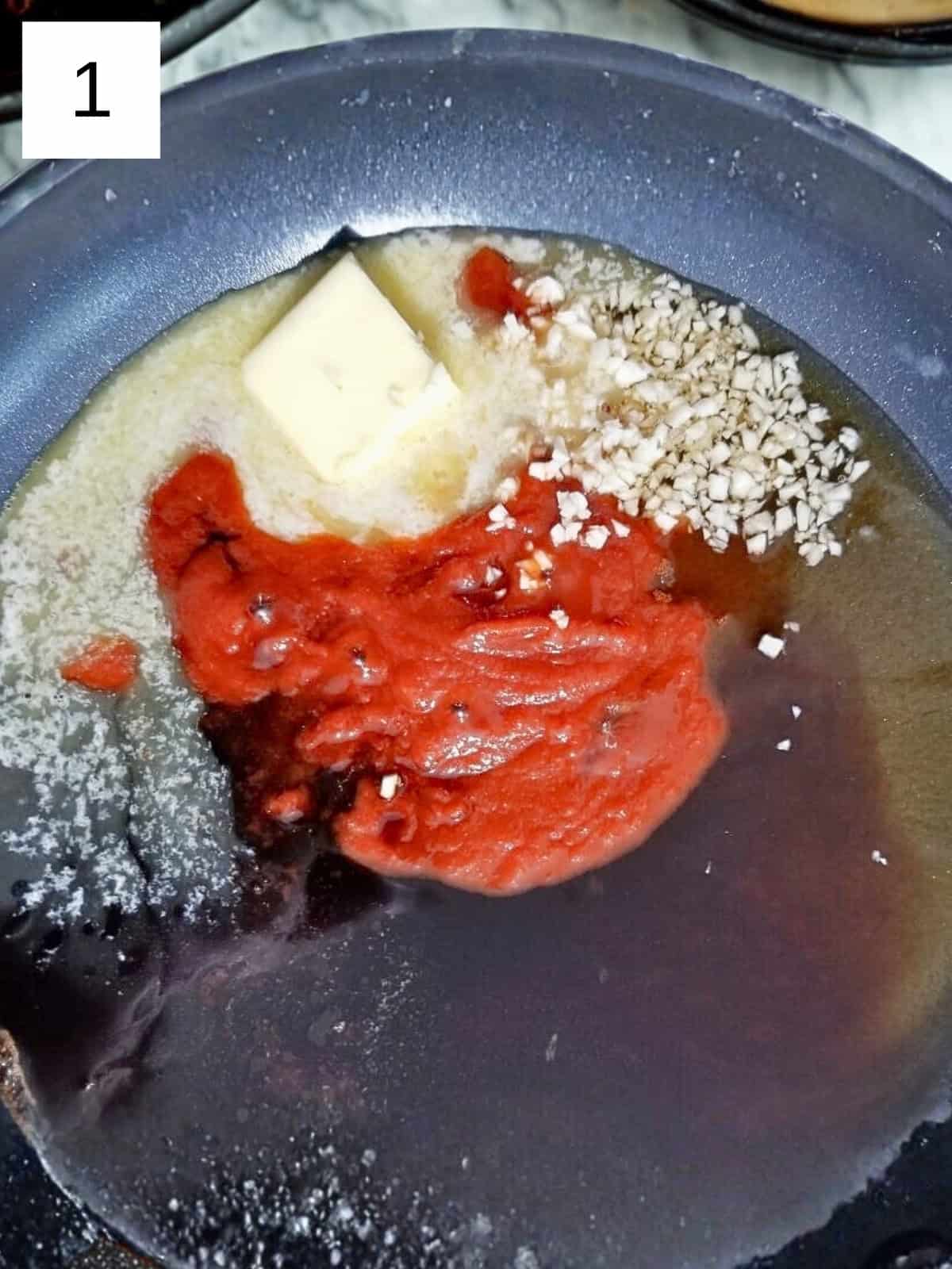 Ingredients for honey sriracha sauce, including sriracha, butter, minced garlic, soy sauce, and rice vinegar, in a pan.