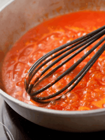 Thickened sauce in a pan.