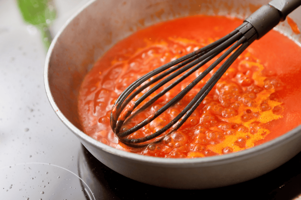 Thickened sauce in a pan.