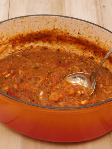 A ceramic cooking pot of overly spicy sauce.