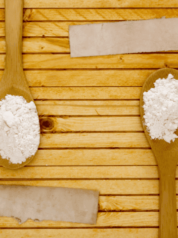 Two spoons full of cornstarch and flour.