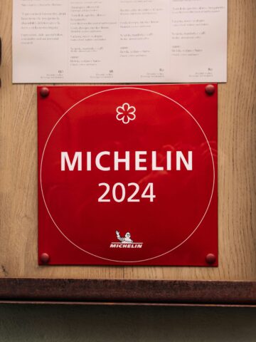 Michelin 2024 guide sign displayed outside a restaurant in Seoul, Korea.