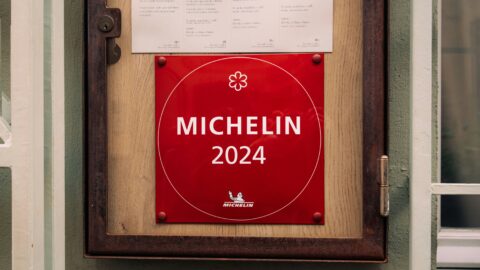 Michelin 2024 guide sign displayed outside a restaurant in Seoul, Korea.