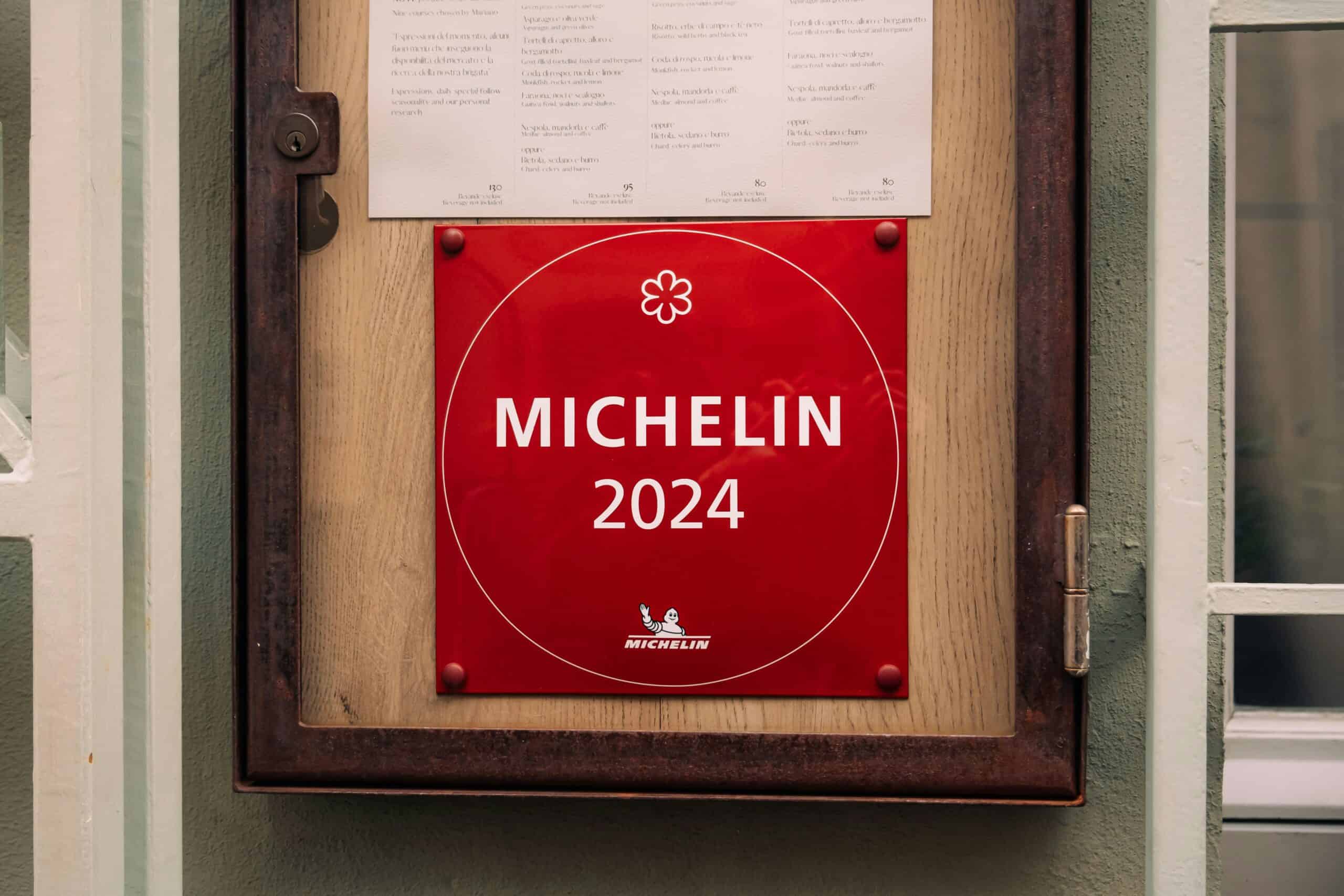 Michelin 2024 guide sign displayed outside a restaurant in Seoul, Korea.