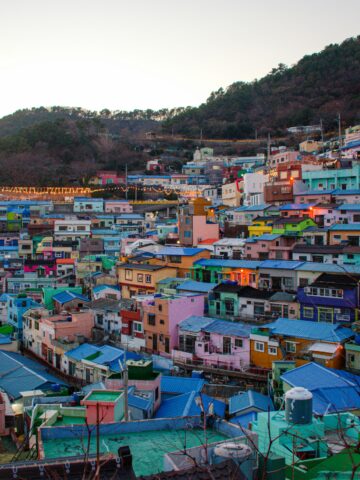 Vibrant hillside neighborhood with colorful houses in Seoul, South Korea, showcasing urban charm and.